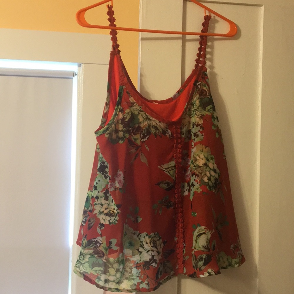 Red floral flowing tank with sheer layer on top